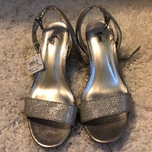 Silver heels. New with tags. Size 7.5